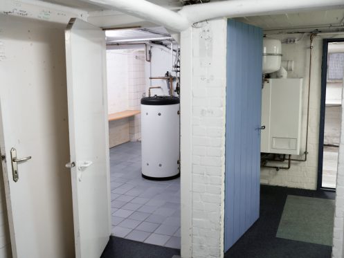 corridor, heating unit and garage in an old basement